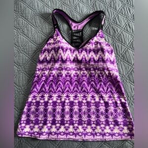 NWOT. ZeroXposur Swimsuit Top. Size Large. Purple pattern.